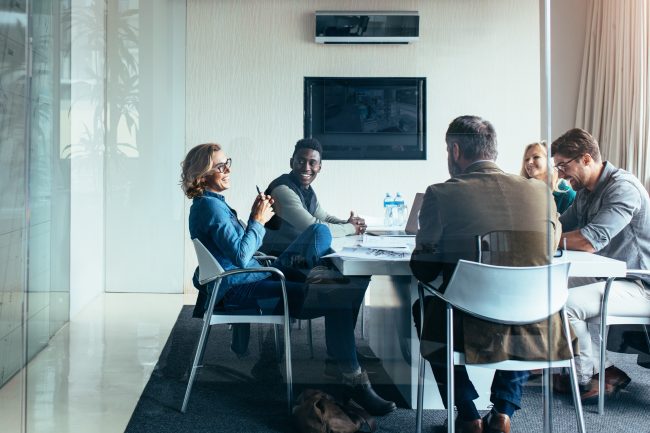 Outsourcing marketing collaboration teamwork agency. Image of a company and agency working together.